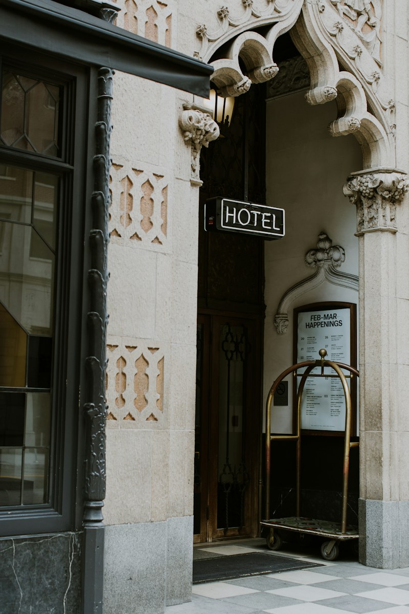 brown trolley under Hotel sign