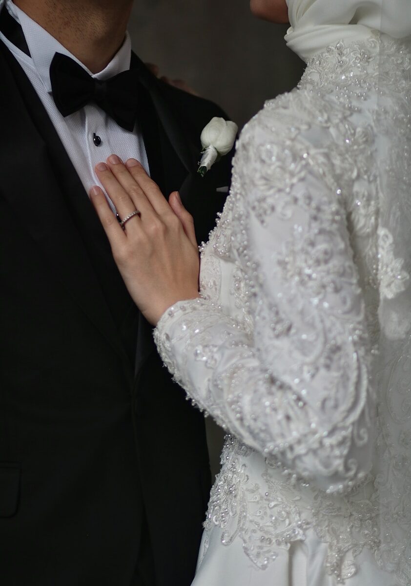 a man and a woman dressed in black and white
